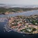The Isle of Marstrand from above reveals sailboats in the harbor, wooden cottages and a stone fortress on a hill